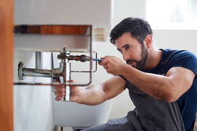 Mr Perfect Plumbing conducting drain services in a Parker home