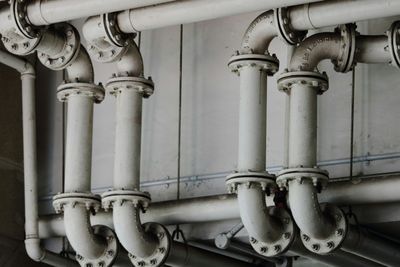 Photo of white metal plumbing pipes