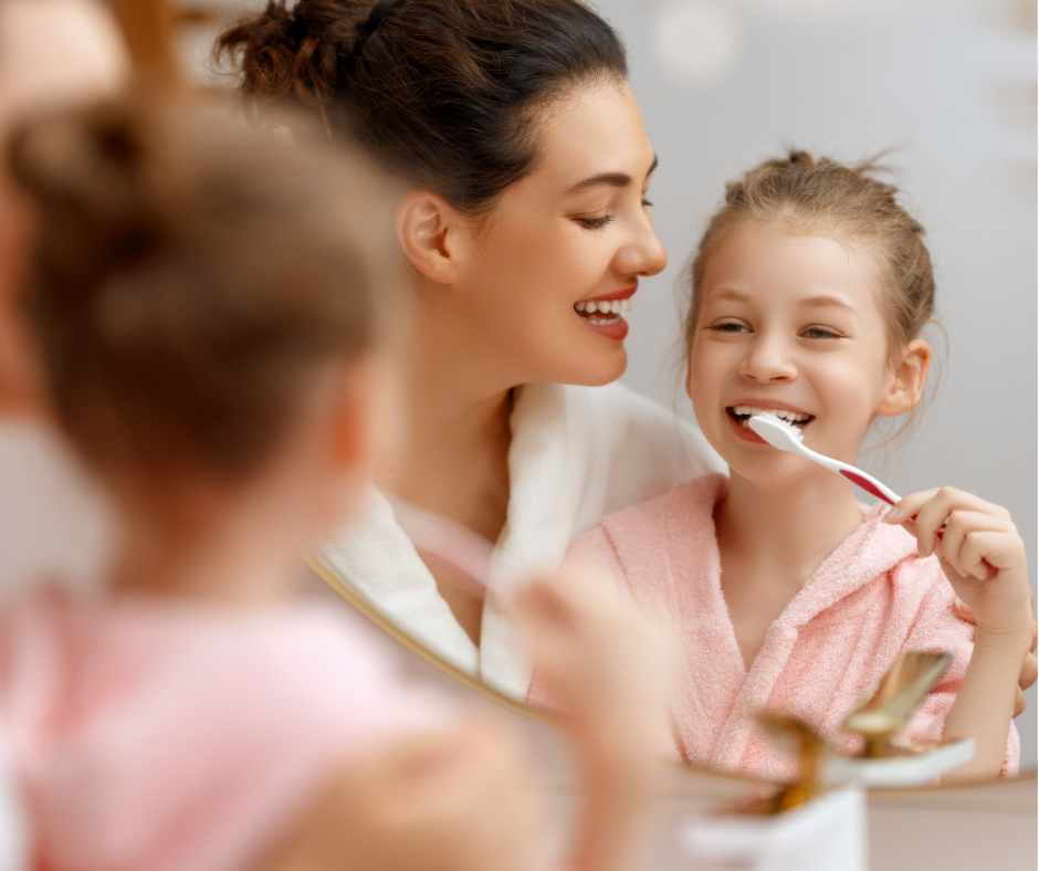 Girl brushing her teeth
